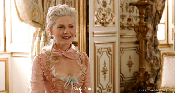 Kirsten Dunst as Marie Antoinette. Baby pink and blue ribbons, pretty ruffles and gold gilded walls