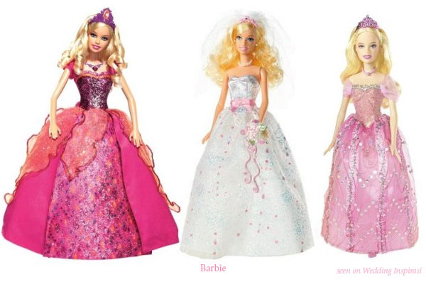 Barbie dolls in various pink gowns, including wedding dress with pink sash