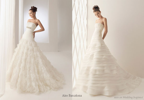 Horizontal ruffle layered lace silk wedding gown from bridal house Aire Barcelona